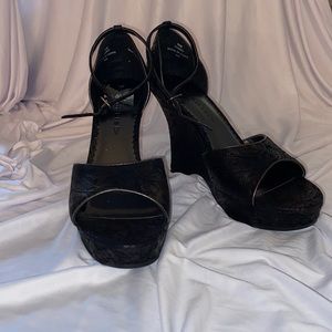 Women’s strappy wedge heel.